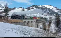 BC Winterdampffahrt Zweisimmen - Montreux am 4. März 2018 mit den HG 3/4 FO 4 und BFD 3.<br>
Viadukt bei Flendruz.