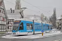 Be 6/8 Flexity 5028, mit der IWB Werbung, wartet an der Endstation der Linie 6 in Allschwil. Die Aufnahme stammt vom 28.02.2018.
