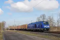Die 246 049-2 der Press mit einem Innofreight-Container Ganzzug am 06.02.2018 in Nassenheide.