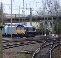 Die Class 66 266 118-9 von Railtraxx  kommt als Lokzug aus Belgien nach Aachen-West und fährt in Aachen-West ein. 
Aufgenommen vom Bahnsteig in Aachen-West. 
Bei Regenwetter am Kalten Nachmittag vom 9.3.2018. 