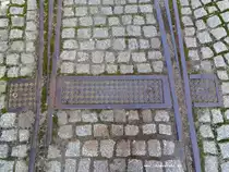 In der Talstr. 90 in Meissen bei Dresden befinden sich noch Gleisreste der 1967 stillgelegten Straßenbahn