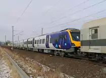 Hier noch ein Bild des britischen Triebzuges (195 101), der am 18.03.2018 von der neuen Railadventure 111 215-0 in Richtung Eisenach überführt wurde. Aufgenommen bei Herleshausen.