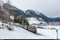 GV-Fahrt der Dampffreunde der RhB am 17. März 2018 von Chur nach Bergün und zurück mit der Ge 4/6 353.<br>
Nach Aussteigen der Fahrgäste in Bergün fuhr der Zug leer nach Samedan. Hier oberhalb Bergün mit dem Dorf im Hintergrund.