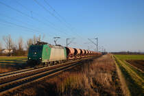 185 517 mit dem Magnesitzug am 23.02.2014 bei Plattling. 