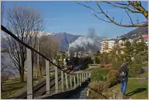 Richtung Norden dampft die 01 202 mit ihrem Extrazug des  Eisenbahn Nostaligiefahrten Bebra e.V.  kurz nach der Abfahrt in Locarno bei Muralto vorbei.
(22.03.2018)