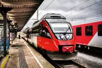 4024 122-6  Sonnenstadt Lienz  hält als S1 4228 (Lienz - Friesach) in Villach Hbf.
Aufgenommen am 18.3.2018.