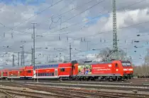 DB Lok 146 113-6 fährt beim Badischen Bahnhof ein. Die Aufnahme stammt vom 16.03.2018.