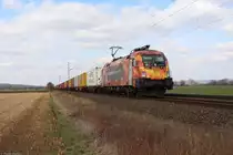 182 572 TXL (Wir brennen für das was wir tun) mit einem Containerzug bei Niedernjesa am 30.03.2018
