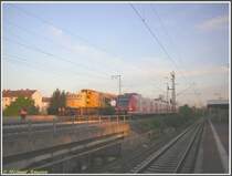 Eine Leerfahrt mit 423 374 fuhr auf dem Bahndamm von Frankfurt am Main-S�d kommend am 21.04.2007 am Bahnhof Niederrad vorbei, wo ein Gleiskran der Firma Spitzke gerade bei der Arbeit war.