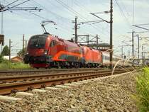 Die 1116-200 im RailJet-Design - dieser Designvorschlag hat gewonnen - mit dem �EC 162 Transalpin, kurz nach der Ausfahrt aus dem Hauptbahnhof Wels. [27.05.07,11:37] Danke!