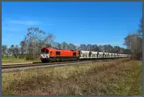 266 107-2 der ITL zieht den Kieszug aus Mühlberg durch Jütrichau. (07.04.2018)