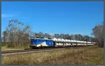 140 848-3 der EVB rollt am 07.04.2018 mit einem Autozug durch Jütrichau.