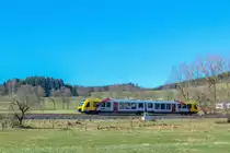VT 506 (95 80 1648 106-0 D-HEB / 95 80 1648 606-9 D-HEB) verlässt als RB 93 nach Betzdorf den Ort Womelsdorf in Richtung Erndtebrück.