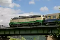 218 396-0 BEG am Schluss des Zuges auf der Moselbrücke in Trier, am 28.04.2018.