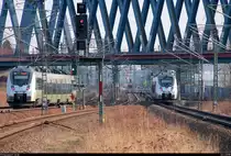 Nachschuss auf 1442 710 (Bombardier Talent 2) der S-Bahn Mitteldeutschland (DB Regio Südost) als S 37525 (S5X) von Halle(Saale)Hbf nach Zwickau(Sachs)Hbf und 1442 178 (MDSB II) als S 37253 (S2) von Leipzig Messe nach Leipzig-Stötteritz, die gemeinsam den Hp Leipzig Messe verlassen. [24.3.2018 | 16:35 Uhr]