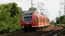 425 029 mit der RB 2 (38856) nach Biblis in der Bibliser Kurve. Aufgenommen am 26. Mai 2018.