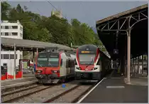 Da seit dem Fahrplanwechsel die IR 15 in Palézieux und Romont halten und die IR 90 in Lausanne ein paar Minuten vorzeitg abfahren besteht in Lausanne kein Anschluss mehr. Dieser wird zumindest an Wochenenden nun via  Train des Vignes  hergestellt, wobei der Domino dafür bis nach Palézieux verkehrt und hier bei seiner Kurzwende in Vevey den RE Genève - Vevey trifft.
Vevey, den 26. Mai 2018