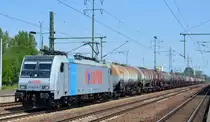 Die polnische LOTOS mit Rpool E 186 276-2 und Kesselwagenzug am 31.05.18 Durchfahrt Bf. Flughafen Berlin-Schönefeld.