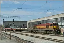 Die Eestiiraudtee Diesellok C36-7 N° 1538 erreicht mit einem Güter-/Dienstzug den Bahnhof von  Tallinn.
9. Mai 2012