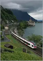 Die beiden hellen Flirts, die den Halt Veytaux-Chillon erreichen geben einen schöne Kontrast zum dunkeln Wetter im Hintergrund.
13. Juni 2018