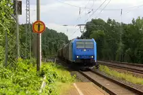185 515-4 von Railtraxx kommt als Umleiter aus Richtung Aachen-West mit einem gemischten Güterzug aus Antwerpen-Waaslandhaven(B) nach Linz-Voestalpine(A) und fährt durch Kohlscheid und fährt in Richtung Herzogenrath,Neuss. 
Aufgenommen von Bahnsteig 1 in Kohlscheid.
Bei Sonnenschein und Wolken am Nachmittag vom 21.6.2018. 