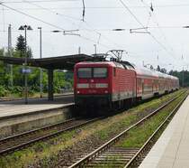 112 188 mit dem RE5 nach Stralsund am Haken am 17.06.2018 in Neustrelitz.