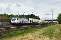 Metronom RB31 kommend aus Hamburg-Harburg mit der schicken ME 146-502-0  Verliebt in/nach Lüneburg .  Höhe Bardowick 12.06.2018.