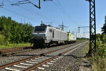 Akiem 37029 mit einer Captrain 185 CL  003 am Haken in Lintorf gen Entenfang. 3.7.2018