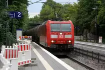185 080-9 DB kommt mit einem Kesselzug aus Antwerpen-Noord/Verb.Adp(B) nach Burghausen Wackerwerk(D)  und kommt aus Richtung Aachen-West,Aachen-Schanz,Aachen-Hbf,Aachen-Rothe-Erde und fährt durch Aachen-Eilendorf in Richtung Stolberg-Hbf(Rheinland)Eschweiler-Hbf,Langerwehe,Düren,Merzenich,Buir,Horrem,Kerpen-Köln-Ehrenfeld,Köln-West,Köln-Süd. Aufgenommen vom Bahnsteig 2 in Aachen-Eilendorf. 
Bei Sommerwetter am Nachmittag vom 9.7.2018.