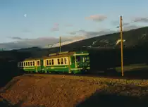 Transports de la région Morges-Bière-Cossonay, MBC/BAM.
Morgenstimmung bei Ballens an einem sehr kalten aber herrlichen  Morgen im Februar 1984.
Während sich am Himmel der Mond verabschiedet fährt der Regionalzug nach Morges mit dem Be 4/4 14  aus dem Schatten in die erste Morgensonne.
Foto: Walter Ruetsch
