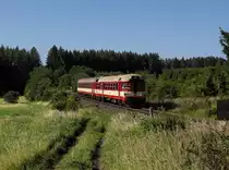Der 854 031 als R nach Prag am 07.07.2018 unterwegs bei Lešetice.