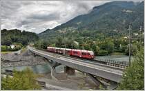 S2 1558 mit ABe 4/16 3105 auf der Hinterrheinbrücke bei Reichenau-Tamins. (21.07.2018)