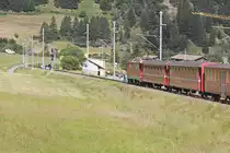 Unbekannte Ge 4/4 II auf der Strecke St. Moritz - Chur gesehen aus dem letzten Wagon kurz vor Zernez.