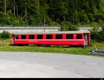 RhB - Personenwagen 1Kl. A 1238 abgestellt in einem Industriegeleise ausserhalb von Rueun am 27.07.2018