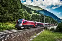 1116 236-1 überquert mit dem railjet 110  Hohe Tauern  (Klagenfurt Hbf - München Hbf), die Falkenstein-Brücke, kurz vor der Haltestelle Oberfalkenstein.
Aufgenommen am 30.7.2018.