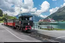 Dampfzug der Achenseebahn mit Lok 4 am 26. Juli 2018 an der Endstation Seespitz mit dem MS Tirol im Hintergrund, welches Umsteigepassagiere aus Pertisau gebracht hat.
