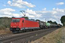 185 603-3 mit einem Öler am Haken bei Kaarst Broicherseite aus Richtung Weißenberg kommend und in Richtung Osterath fahrend am Abend des 10.8.2018