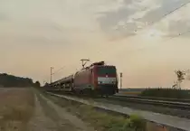 Aus Rotterdam kommend und nach Dillingen fahrend ist hier die 189 051-6 mit einem leeren Autotransportwagenzug für das Fordwerk. Aufgenommen ist das Bild in Gubberath und zeigt den Zug gen Grevenbroich fahrend. 21.8.2018