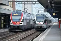 RE4880 mit 511 038 nach St,Gallen und S4 23459 mit 526 043-5 nach Sargans in Buchs SG. (22.08.2018)