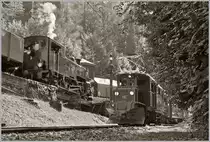 50 Jahre Blonay Chamby - MEGA BERNINA FESTIVAL: Obwohl die RhB und die FO vernetzt sind, dürfte eine Begegnung der RhB 4/4 182 mit der BFD HG 3/4 N° 3 wohl nicht so häufig vorgekommen sein. In Chaulin fährt die RhB Ge 4/4 182 mit dem RhB ABe 4/4 35 an der in der Bekohlungsanlage stehenden BFD HG 3/4 N° 3 vorbei.

8. Sept. 2018