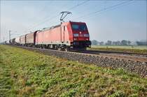 185 247-4 mit einen gemischten Güterzug bei Retzbach-Zellingen am 10.10.2018 in Richtung Norden unterwegs.