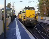 7786,7868 beide von Lineas kommen die Kohlscheider-Rampe hoch aus Richtung Rheydt,Wickrath,Beckrath,Herrath,Erkelenz,Baal,Hückelhoven-Baal,Brachelen,Lindern,Süggerath,Geilenkirchen,Frelenberg,Übach-Palenberg,Rimburg,Finkenrath,Hofstadt,Herzogenrath mit einem langen Kalkleerzug aus Oberhausen-West(D) nach Hermalle-Huy(B) und fahren durch Kohlscheid in Richtung Richterich,Laurensberg,Aachen-West. 
Aufgenommen vom Bahnsteig 2 in Kohlscheid. 
Bei Sonne und Regenwolken am Nachmittag vom 24.9.2018.