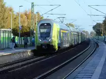Die NordBahn mit dem 445 020,als RE Kiel-Hamburg Hbf,beim Zwischenhalt in Wrist.