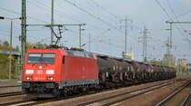 DB Cargo Deutschland AG mit  185 313-4  [NVR-Number: 91 80 6185 313-4 D-DB] und Kesselwagenzug (Schwefel,geschmolzen) am 09.10.18 Bf. Flughafen Berlin-Schönefeld.