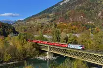 Ge 4/4 III 650 mit einem Regio am 29.10.2016 bei Reichenau. 