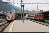 RABe 502 207-9 (Bombardier Twindexx Swiss Express) SBB als RE 5082 nach Zürich HB (CH) trifft auf Re 4/4 II 11134 (420 134-9) als IC 936 (IC 3) nach Zürich HB (CH) in ihrem Startbahnhof Chur (CH).
[10.7.2018 | 18:15 Uhr]