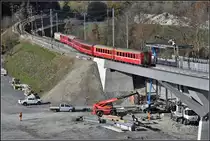 RE1733 mit der Ge 4/4 II 611  Landquart  benützt die provisorische Weichenverbindung Richtung Oberland. (21.11.2018)