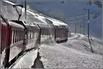 R1633 nach Tirano mit ABe 8/12 3501 kurz vor Ospizio Bernina. (11.12.2018)