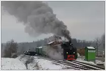 764-411R der Stainzer Bahn am 16.12.2018 kurz nach Preding in Wohlsdorf.
