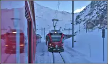 Zugskreuzung in Bernina Lagalb mit R1641 nach Tirano mit ABe 8/12 3513. (11.12.2018)
